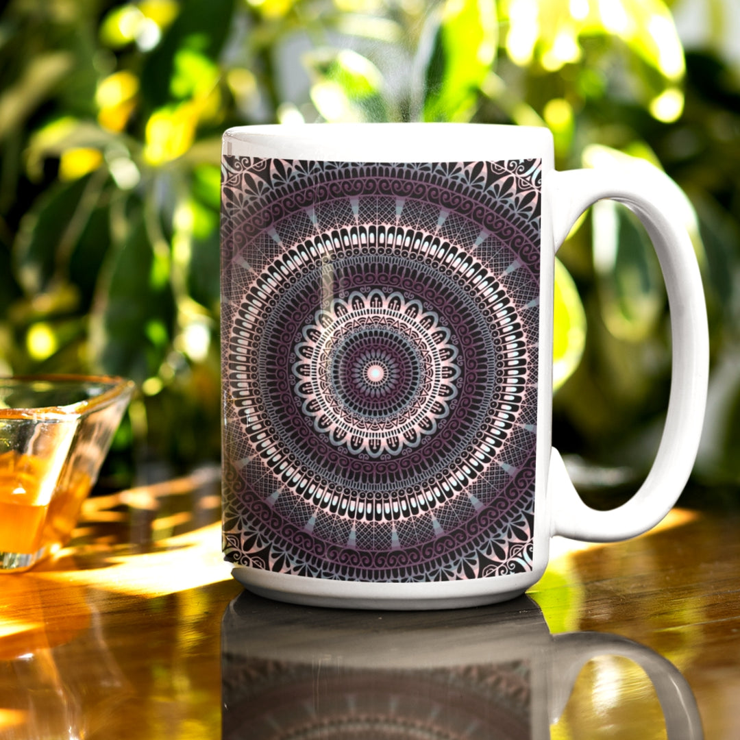 A dark purple and grey mandala mug with intricate design