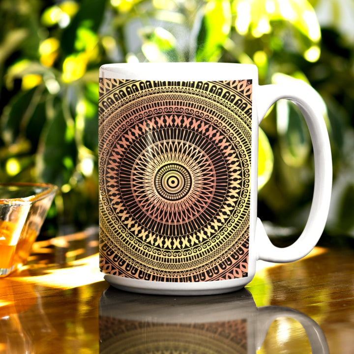 A mandala mug in soft yellow and orange, featuring intricate design that infuses vibrancy and warmth into the visual experience.