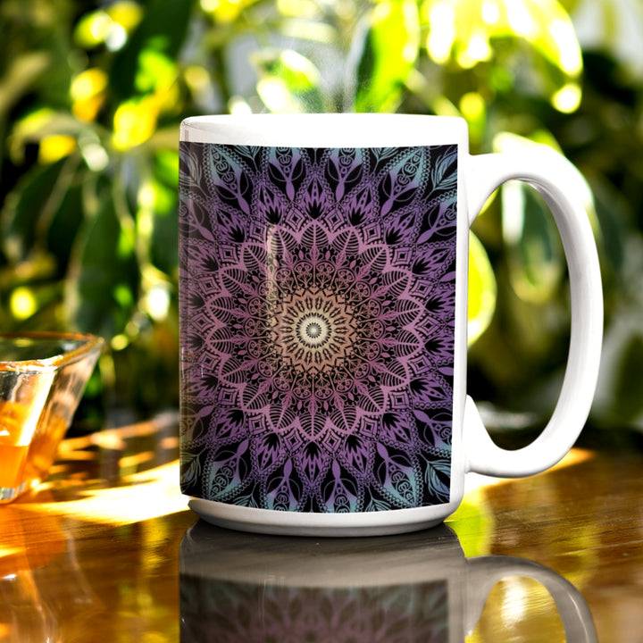 A whimsical Mandala Mug in soft purple, pink, and blue. Intricate patterns create a playful design, infusing charm and vibrancy into your sipping experience."