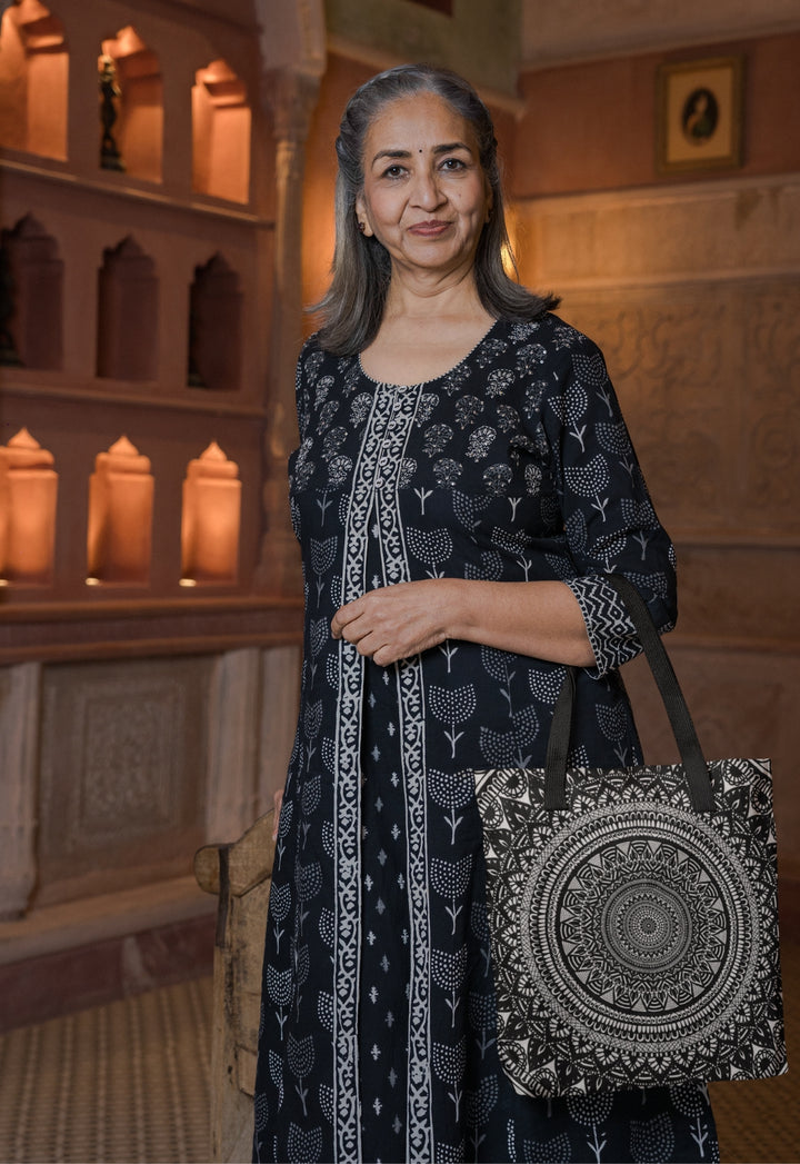 A serene grey mandala tote bag named 'Artful Zen: Grey Mandala' with an intricate Mehndi touch, exuding mindfulness and artistic sophistication."