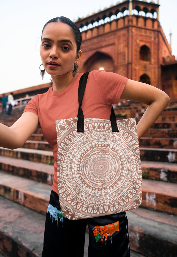  An elegant white mandala tote bag named 'Terracotta Delight: White Mandala' with an intricate Mehndi design, exuding cultural richness and artistic sophistication.