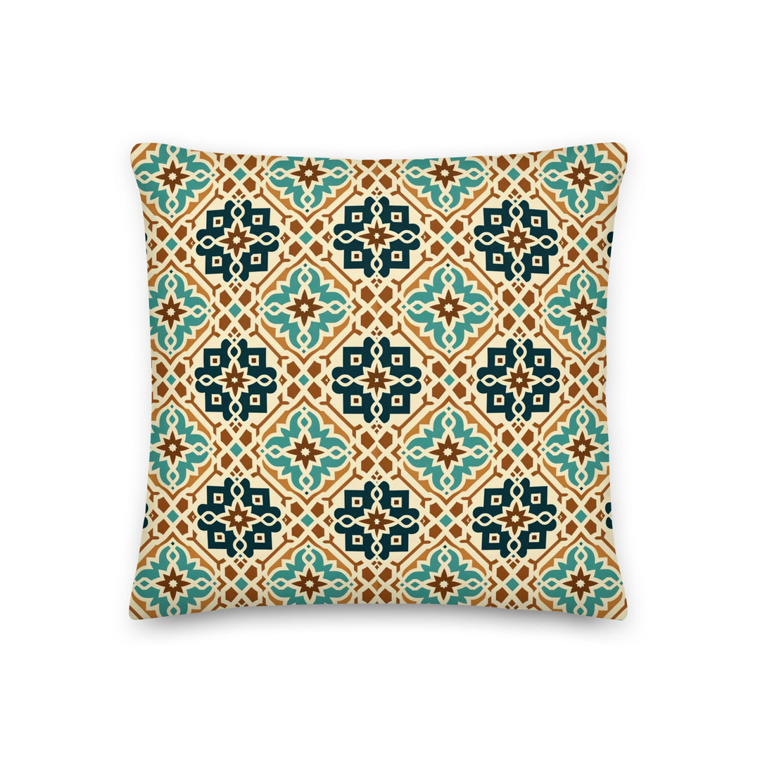 A decorative pillow with an intricate geometric pattern featuring teal, brown, and cream colors, inspired by traditional Moroccan and Mediterranean tile designs