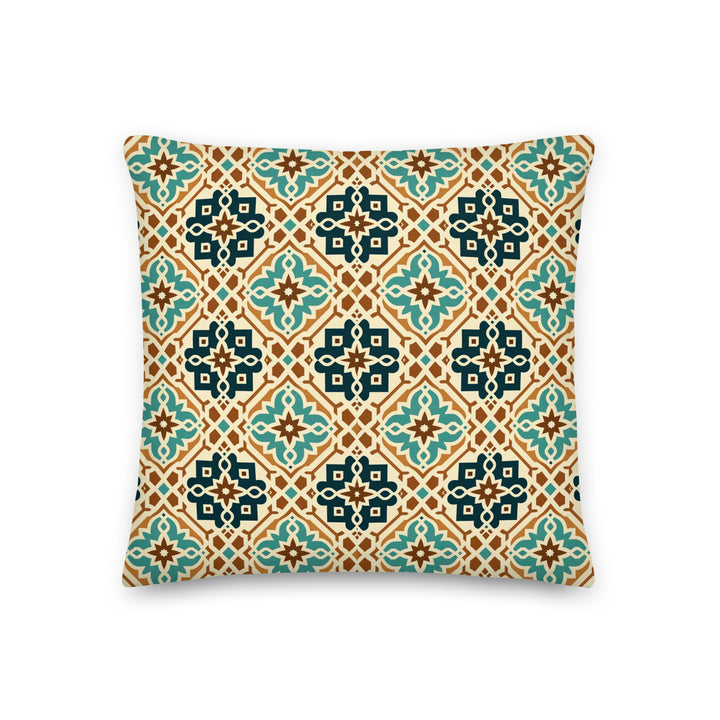 A decorative pillow with an intricate geometric pattern featuring teal, brown, and cream colors, inspired by traditional Moroccan and Mediterranean tile designs