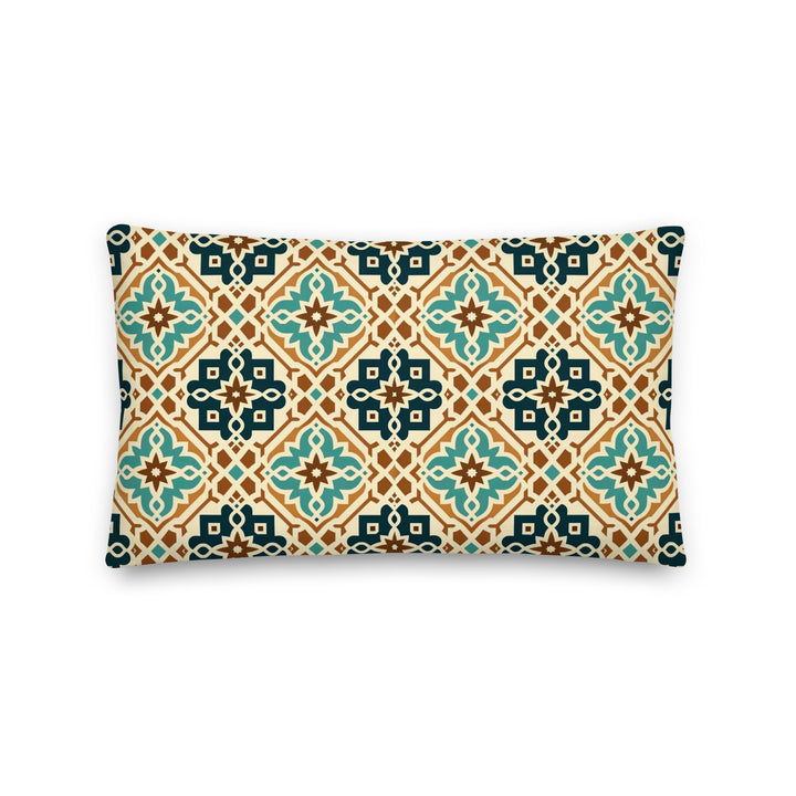 A decorative pillow with an intricate geometric pattern featuring teal, brown, and cream colors, inspired by traditional Moroccan and Mediterranean tile designs