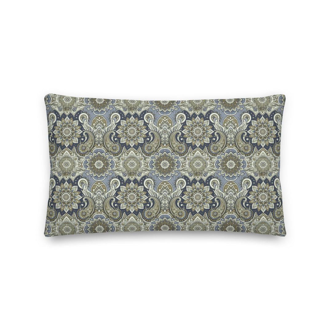 "A decorative lumbar pillow with an intricate paisley and mandala pattern in muted blue, gray, and beige hues