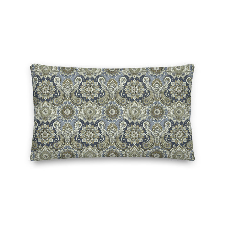 "A decorative lumbar pillow with an intricate paisley and mandala pattern in muted blue, gray, and beige hues