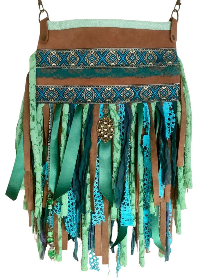 leather crossbody bag with fringe in blue and green