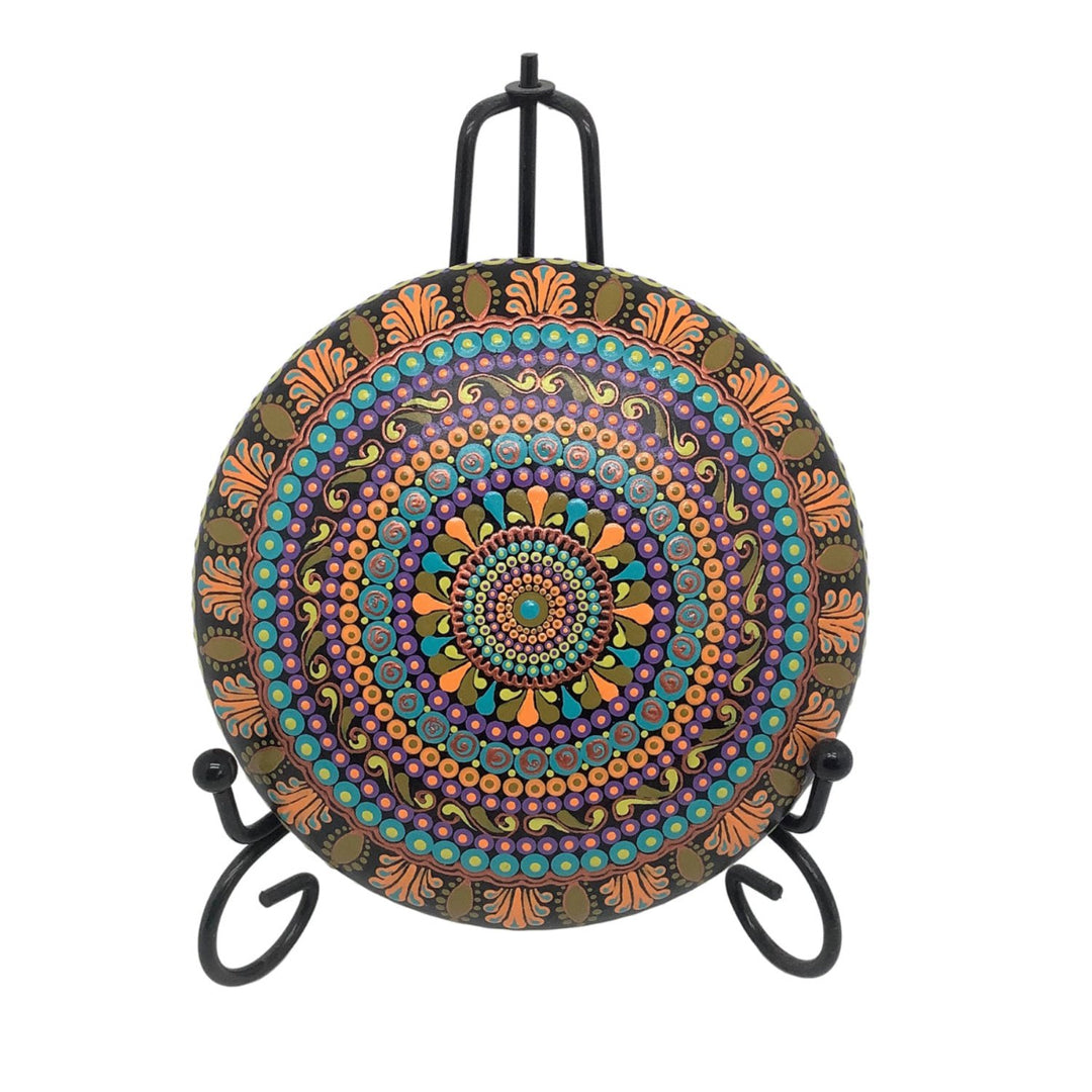 colorful mandala stone on a stand