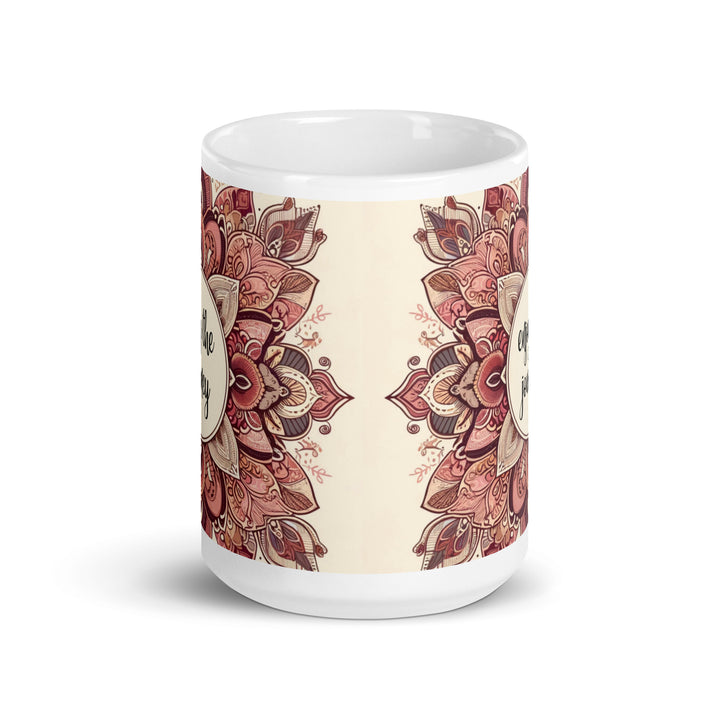 White ceramic mug with a detailed pink and brown mandala design and the phrase 'Enjoy the Journey' in the center