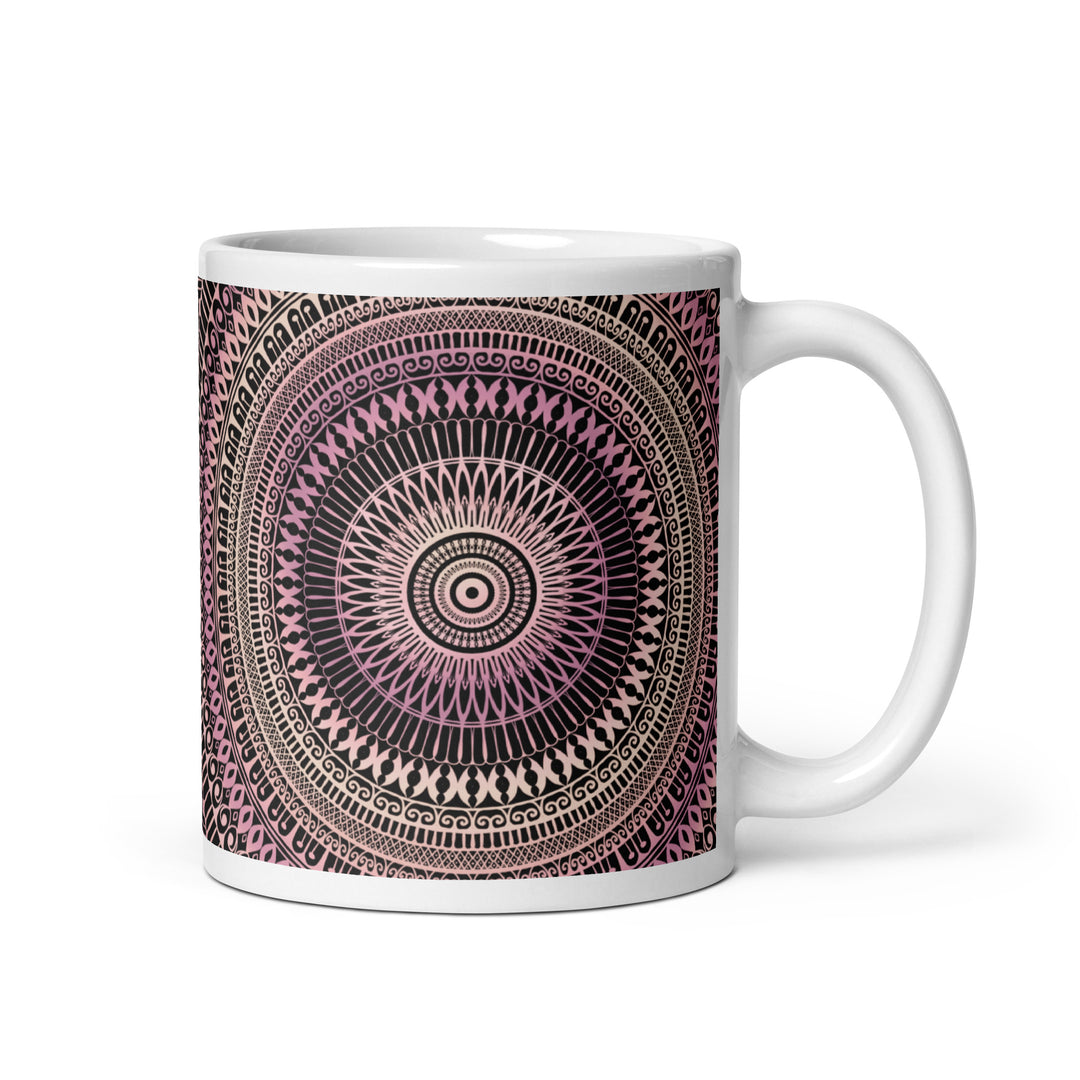 A playful mandala mug in light pink and beige. 